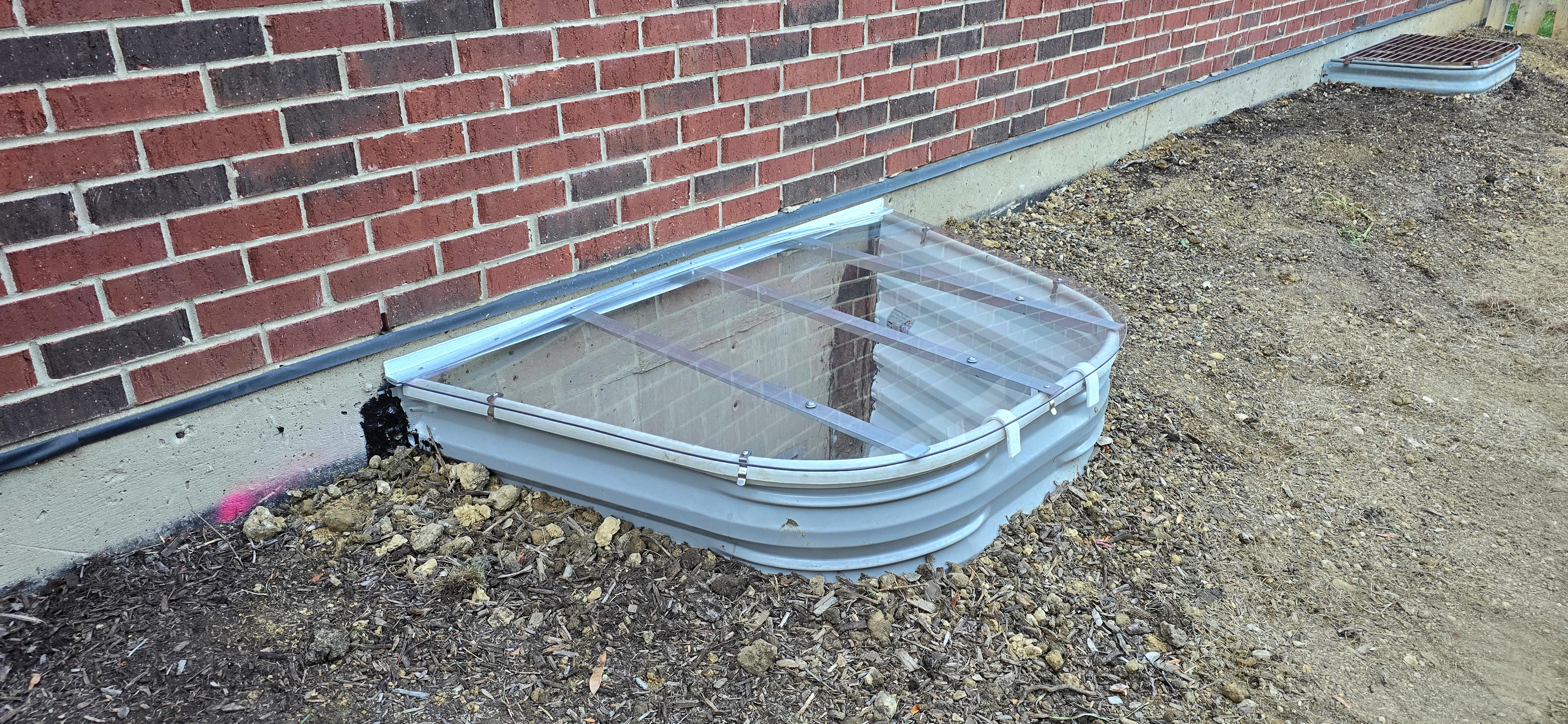 Custom Window Well Cover Installation